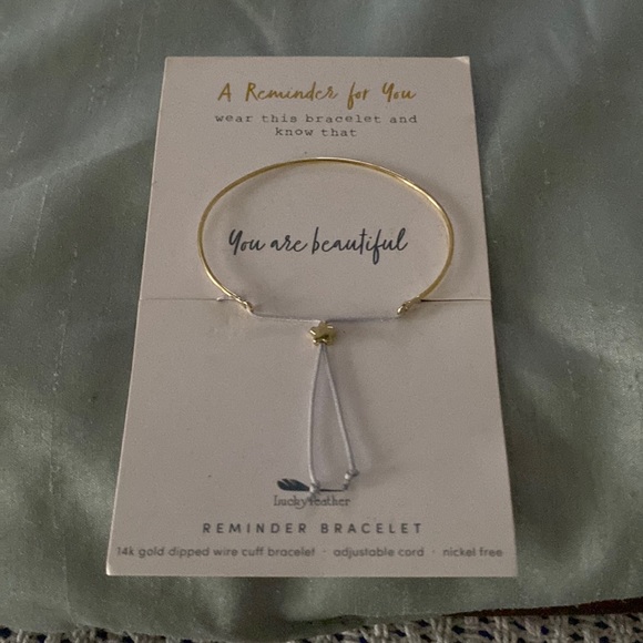 Francesca’s Reminder Bracelet Lucky Feather.. 14k dipped wire cuff.. NWT.. - Picture 1 of 2